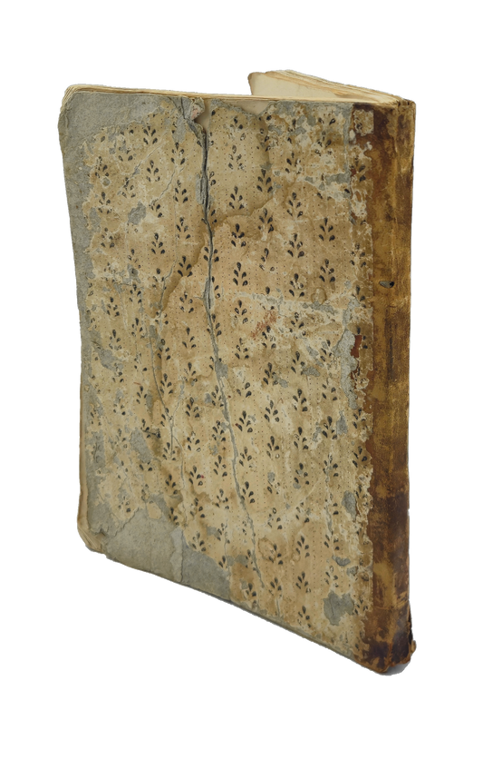Patterned paper binding with worn spine of al-Zawzanī’s commentary on the seven Muʿallaqāt.