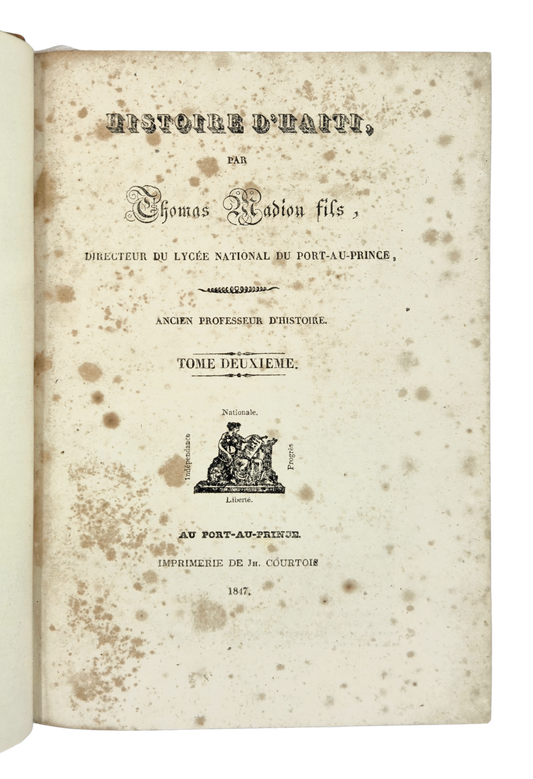 Presentation copy of the first history of Haiti by a Haitian, published in Haiti by a man of colour