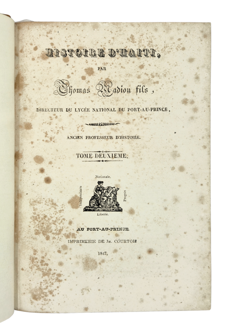 Presentation copy of the first complete history of Haiti, by a Haitian and published in Haiti by a man of colour